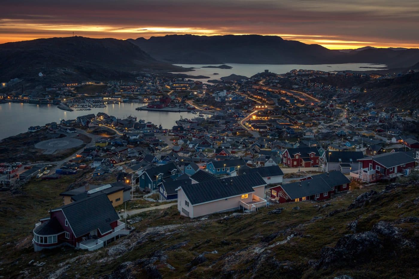 A nighttime panoramic view of Qaqortoq in South Greenland. Photo by Mads Pihl.