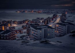 A winter night view from Qinngorput towards Nuuk in Greenland. By Mads Pihl