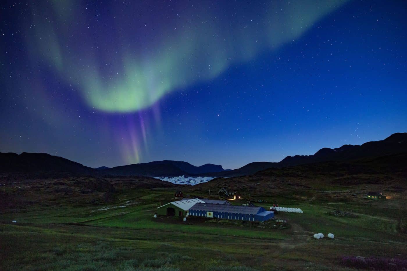 Northern lights over Tasiusaq sheep farm in South Greenland. By Mads Pihl