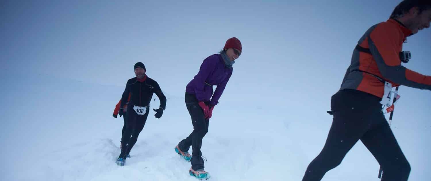 Polar circle marathon participants in snow. By Visit Greenland
