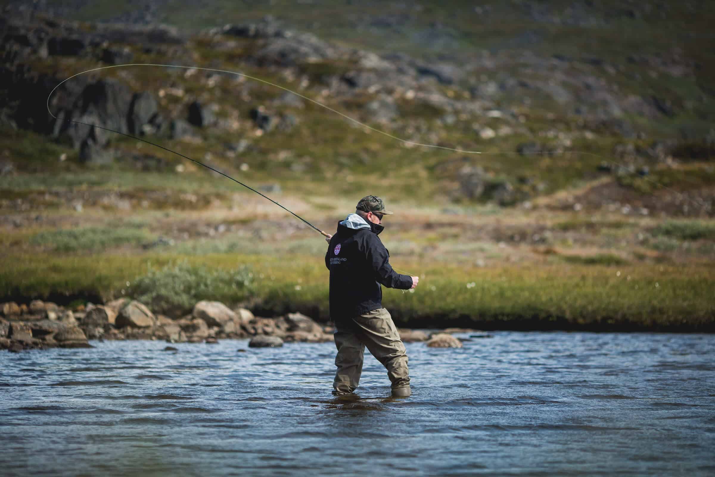 A Guide from South Greenland fly fishing in the Narsaq backcountry. Photo by Mads Pihl