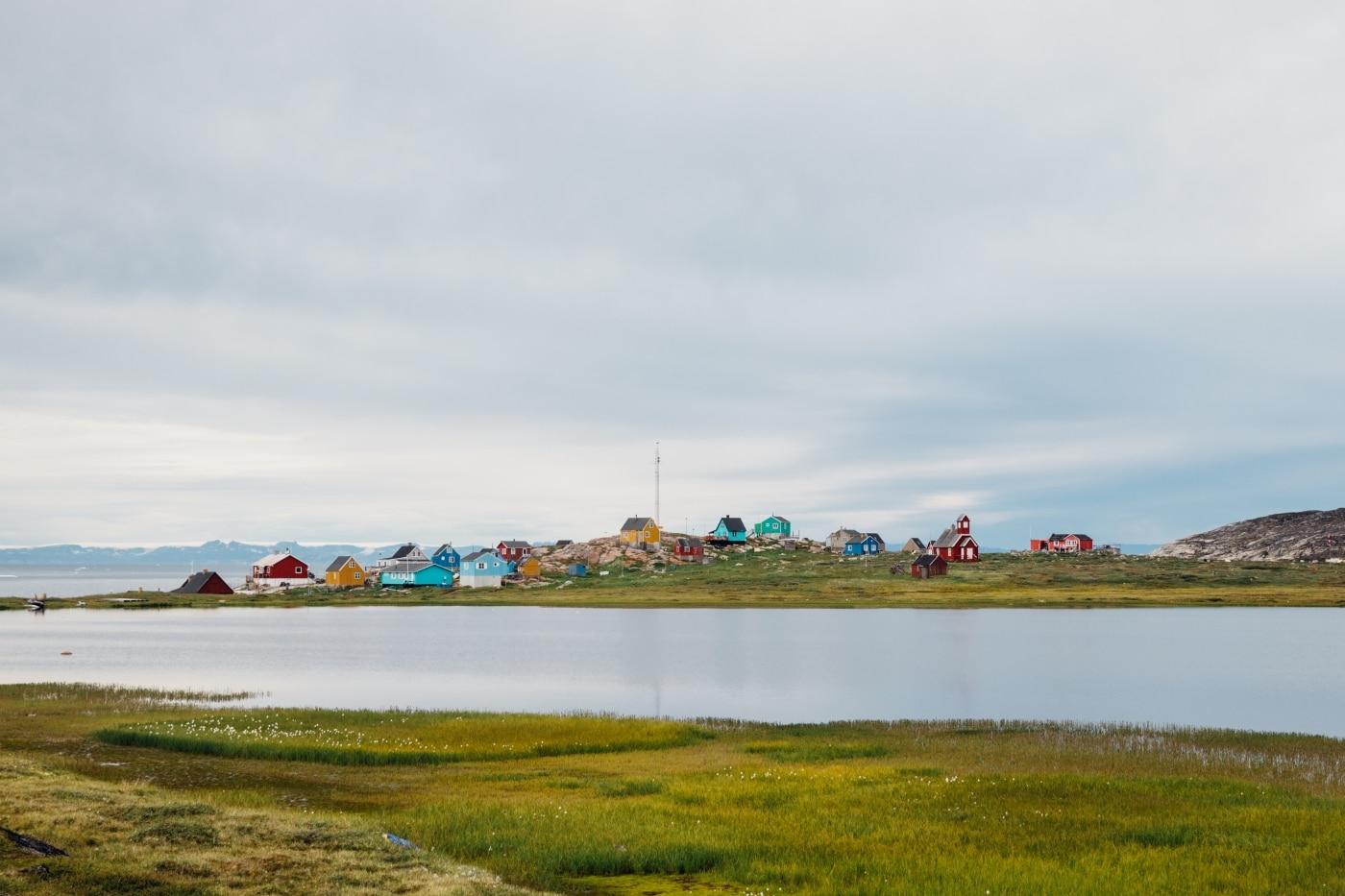 Colourful homes and church in the settlement of Ilimanaq from across the lake 2. Photo by Jessie Brinkman Evans