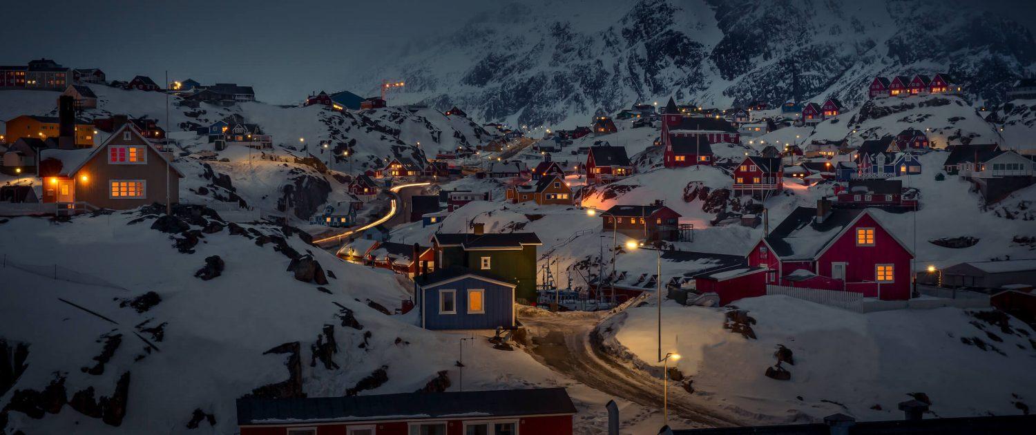 A winter nighttime view of parts of Sisimiut in Greenland. Photo by Mads Pihl