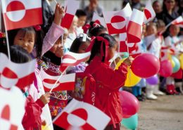 Festivals: Children with Greenland's flag in National Day, by visit Greenland