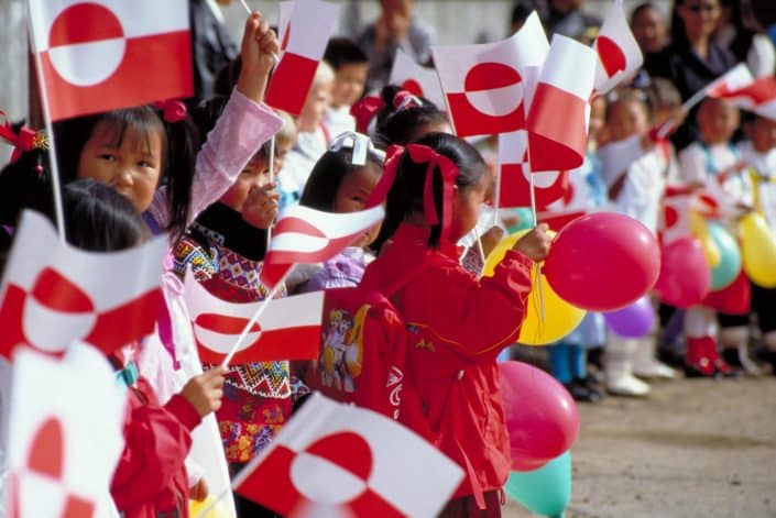 Festivals: Children with Greenland's flag in National Day, by visit Greenland