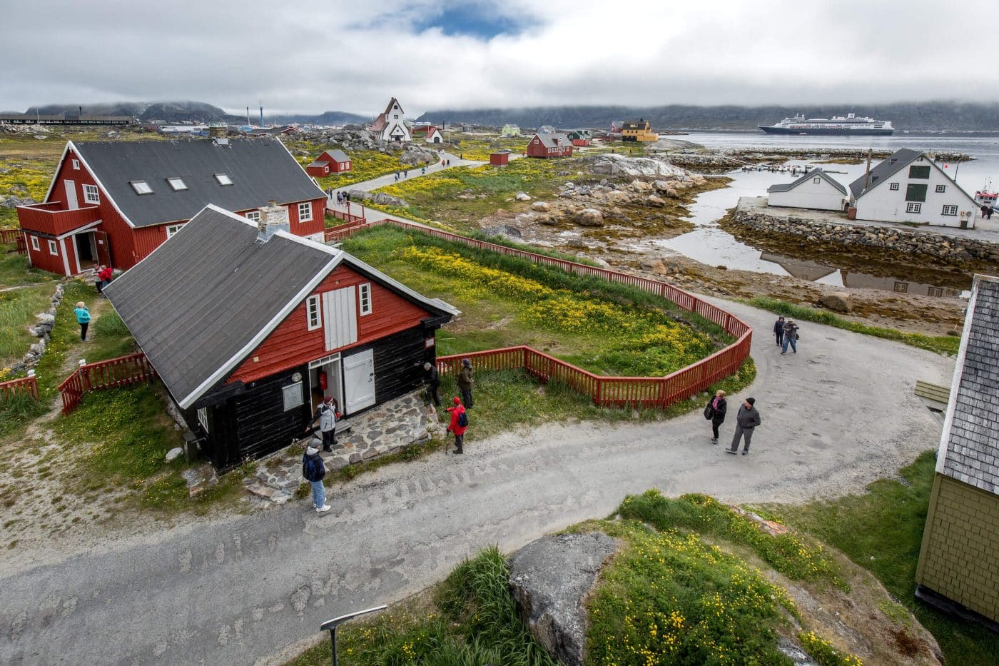Cruise guests from the ship Rotterdam visiting the old museum area of Nanortalik on South Greenland. By Mads Pihl