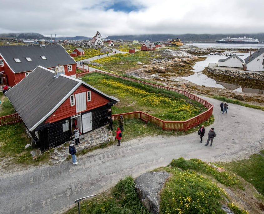 Cruise guests from the ship Rotterdam visiting the old museum area of Nanortalik on South Greenland. By Mads Pihl
