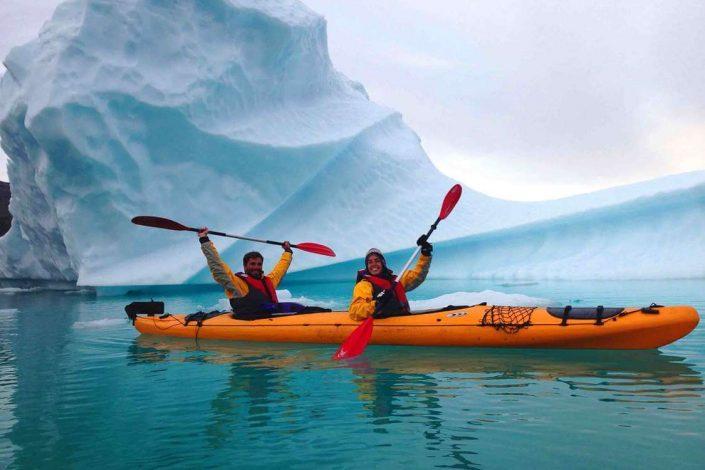 Two kayakers on a sea expedition through icebergs in South Greenland. Photo by Tasermiut South Greenland Expeditions, Visit Greenland