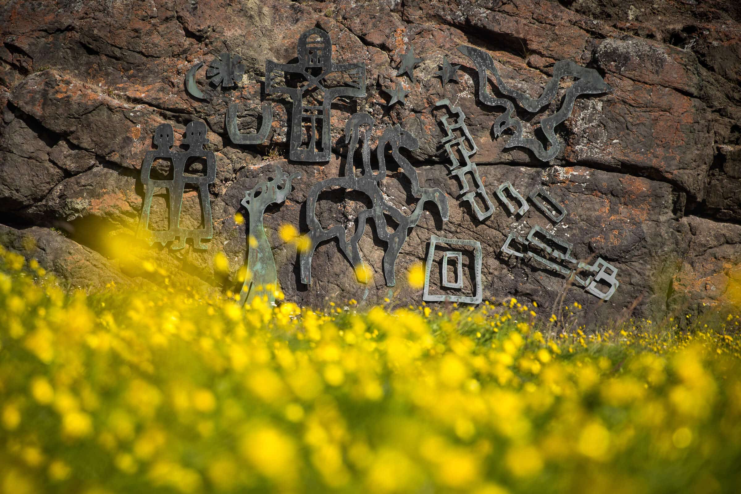 Modern day cast iron norse runes on a rock wall in Qassiarsuk. By Mads Pihl