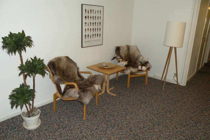 Comfortable seating area in the hallway. Photo by Hotel Sømandshjemmet, Visit Greenland
