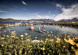The Uunartoq hot springs in South Greenland enjoy a great view of icebergs and mountains. By Mads Pihl