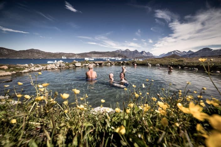 The Uunartoq hot springs in South Greenland enjoy a great view of icebergs and mountains. By Mads Pihl