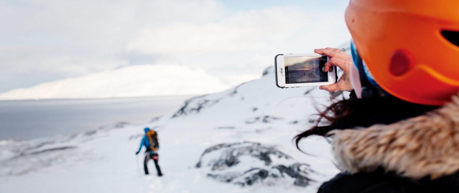 Tourist taking a photo of Marc Carreras in back-country Nuuk in Greenland. By Rebecca Gustafsson