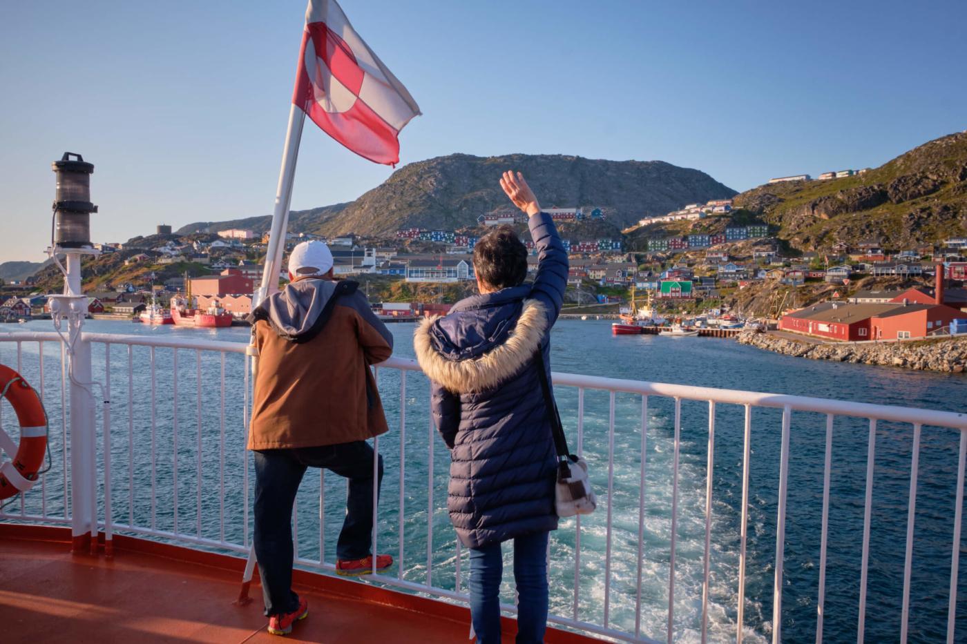 Passengers waving from Sarfaq Ittuk in Qaqortoq. Photo - Lisa Germany - Visi Greenland