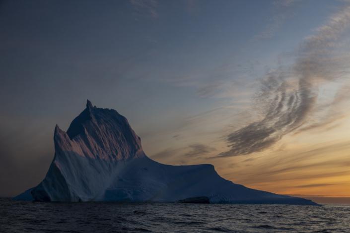 Iceberg in East Greenland in the sunset. Photo by Arctic Dream