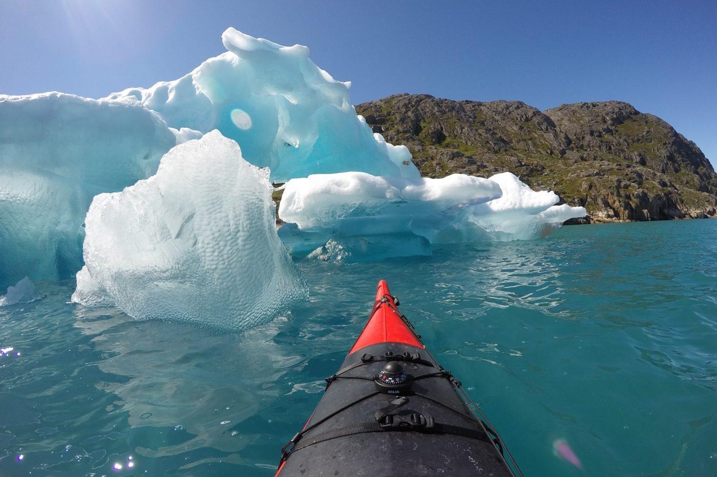 Kayak at Ice. By Visit Greenland