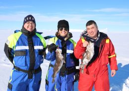 Tourist and local guides with the catch of the day. Photo by Ilulissat Water Safari