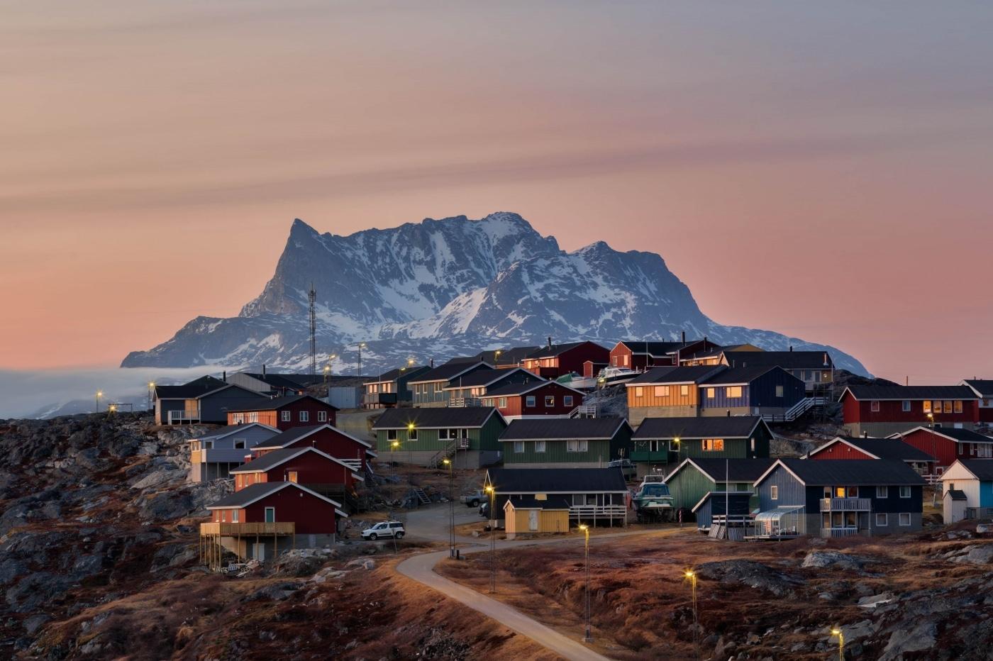 Nuussuaq in an autumn sunset with mount Sermitsiaq in the background in Nuuk in Greenland