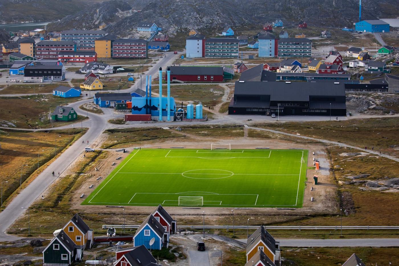 View of the soccer field of Paamiut. Photo by Aningaaq R Carlsen, Visit Greenland