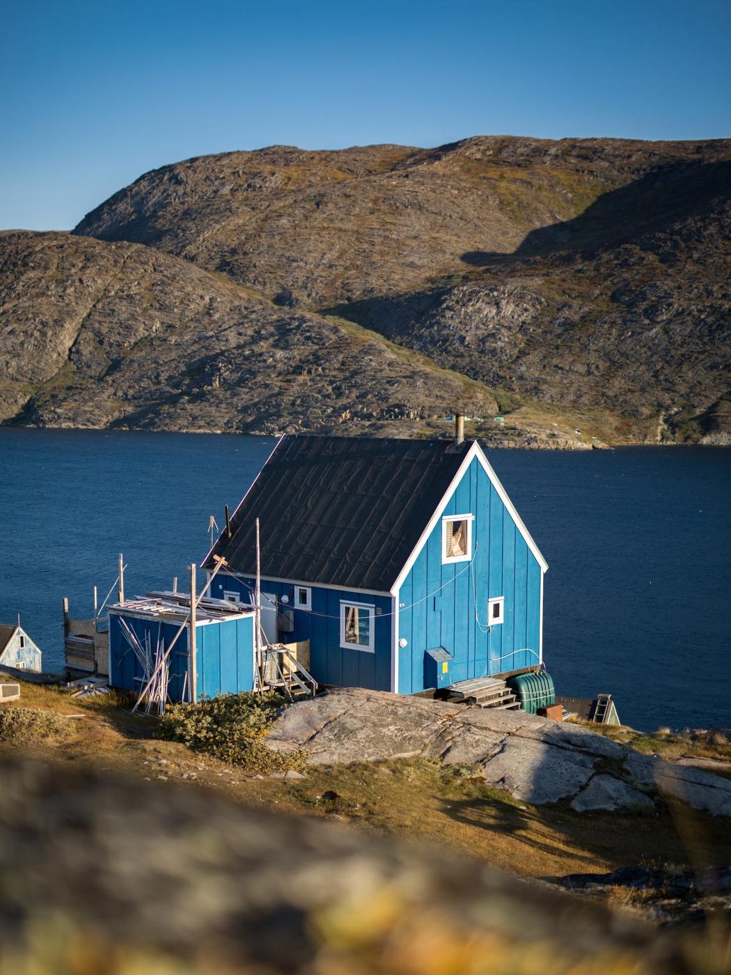 A blue house in Sarfannguit. Photo by Aningaaq R Carlsen - Visit Greenland