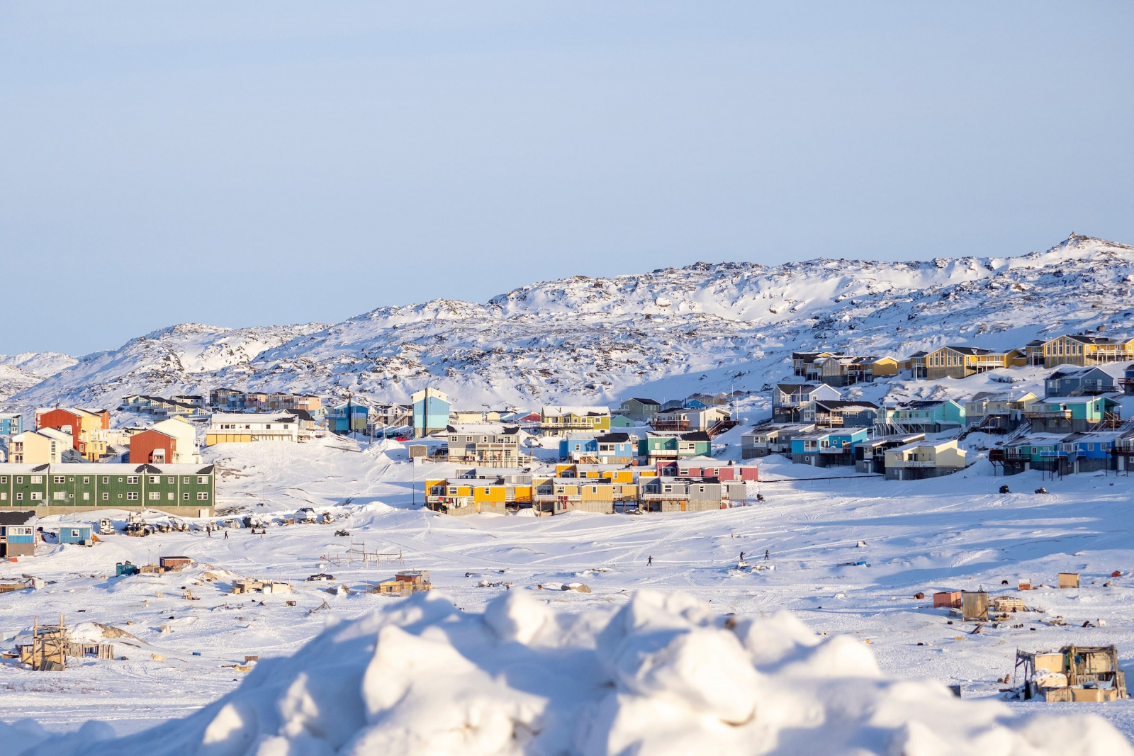 View from a Hill onto Ilulissat and the frozen fjord. Photo - Lisa M. Burns, Visit Greenland