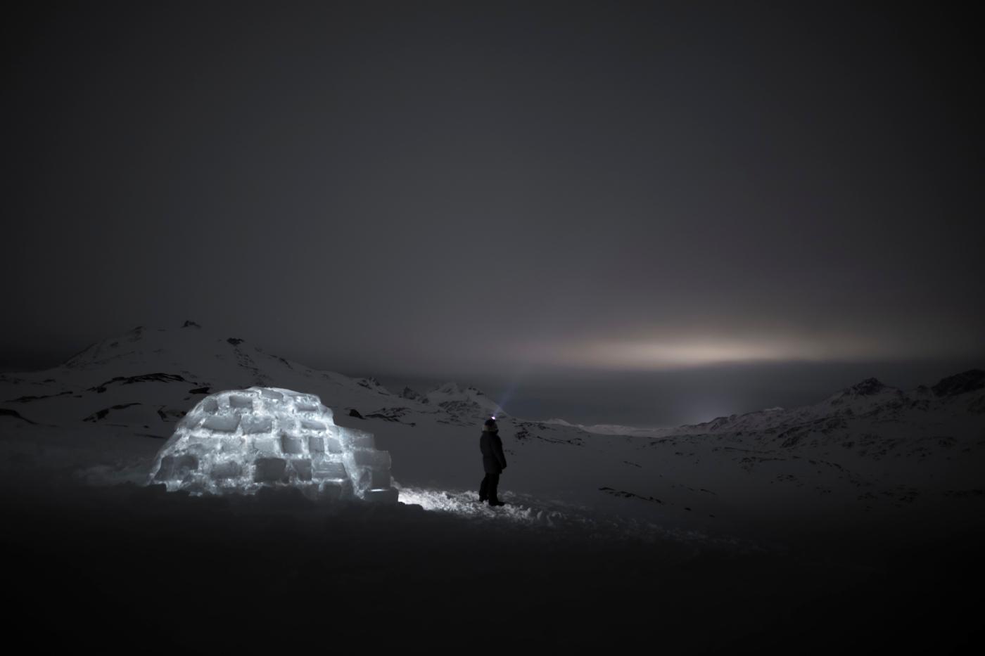 Igloo camping view by the dark night. Photo by Aningaaq Rosing Carlsen - Visit Greenland