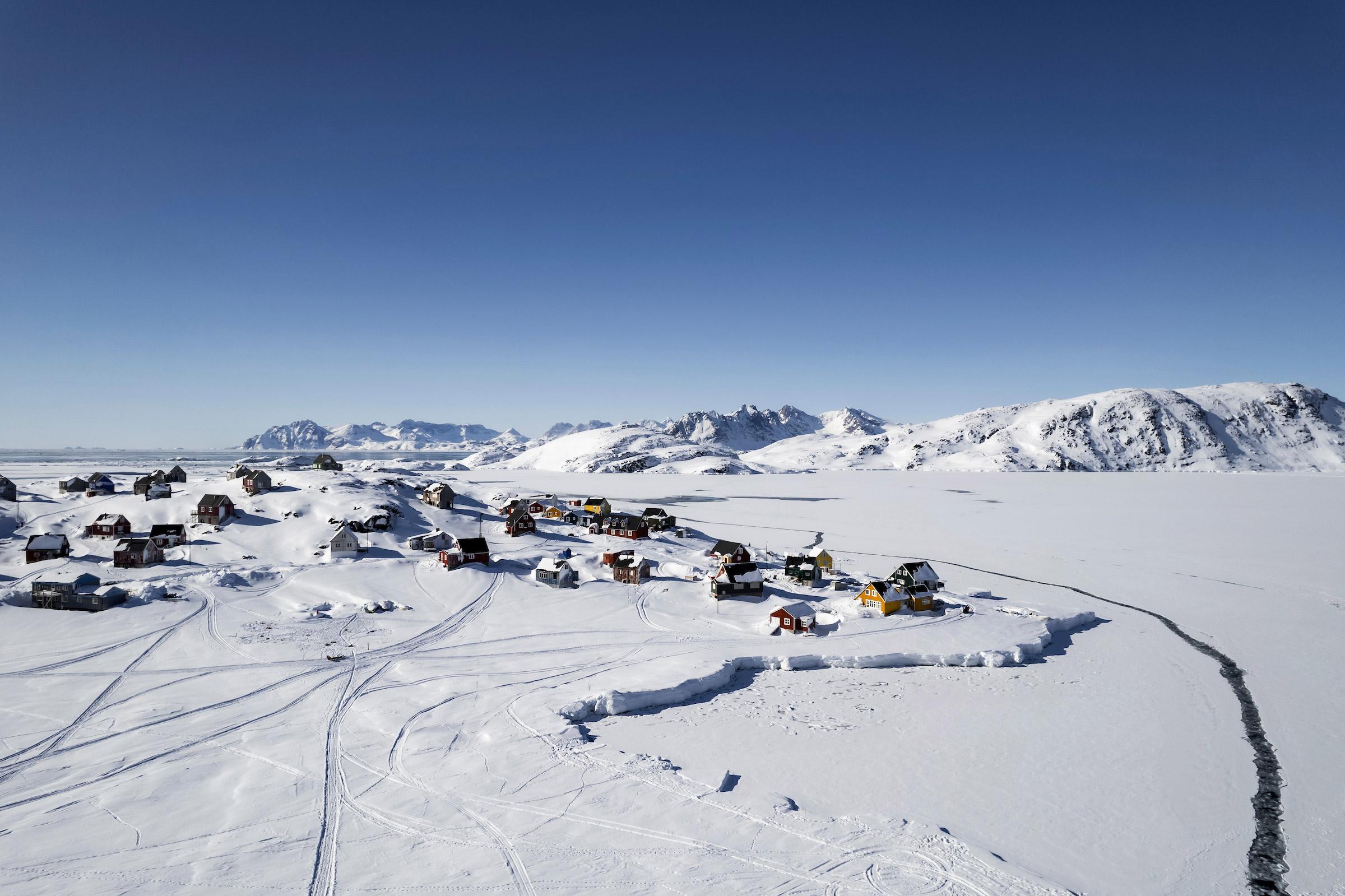 Kulusuk settlement in the winter. East Greenland. Photo by Aningaaq Rosing Carlsen - Visit Greenland