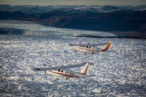 A view of two Air Zafari flightseeing planes over the Greenland Ice Sheet near Kangerlussuaq Airport. By Mads Pihl