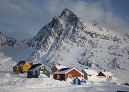 Snow-covered houses in Kuummiut, East Greenland. Photo by Mads Pihl
