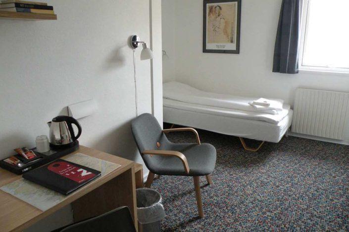 Standard room with single bed. Photo by Hotel Sømandshjemmet, Visit Greenland
