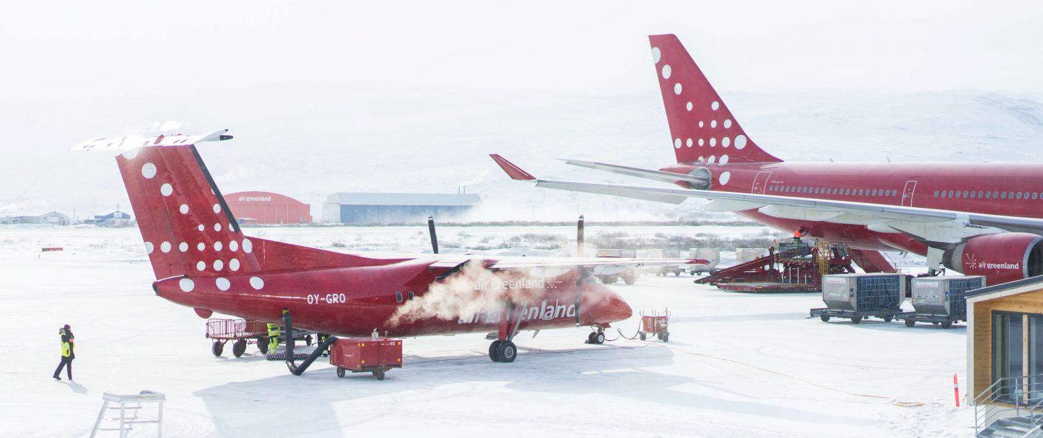Air Greenland airplanes waiting for takeoff in Kangerlussuaq. Photo by Filip Gielda, Visit Greenland
