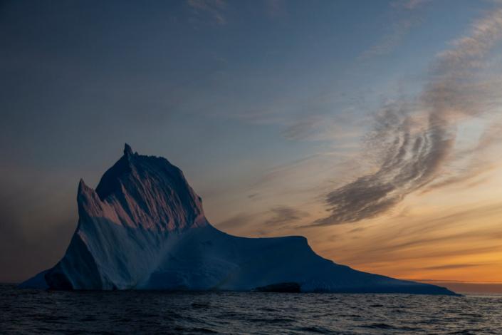Iceberg in East Greenland in the sunset. Photo by Arctic Dream