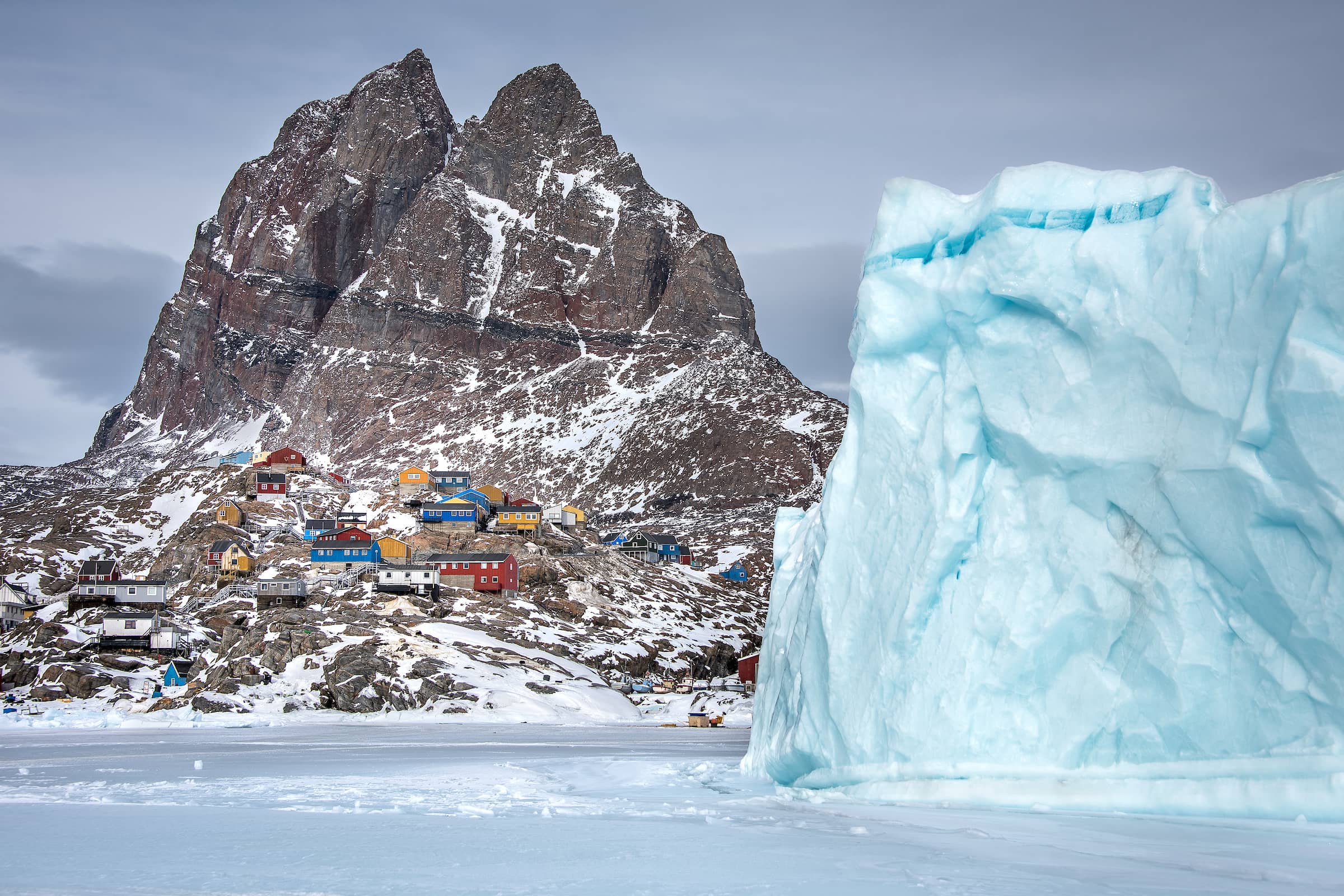 A winter view of the heart shaped mountain and the town of Uummannaq in North Greenland. Photo by Marcela Cardenas - Visit Greenland