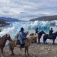 Riding horses on the beach. Photo by Riding Greenland