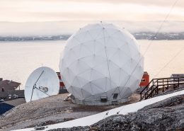 Tele-Post's radome screen with the mountains and sea in the background, in Nuuk. Photo by Filip Gielda