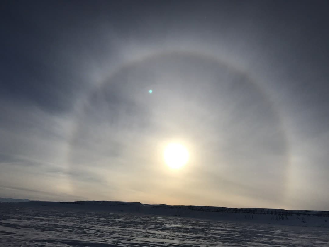 The amazing halo around the sunset, on the snowmobile ride to Constable Point. Photo by Syazwani Baumgartner