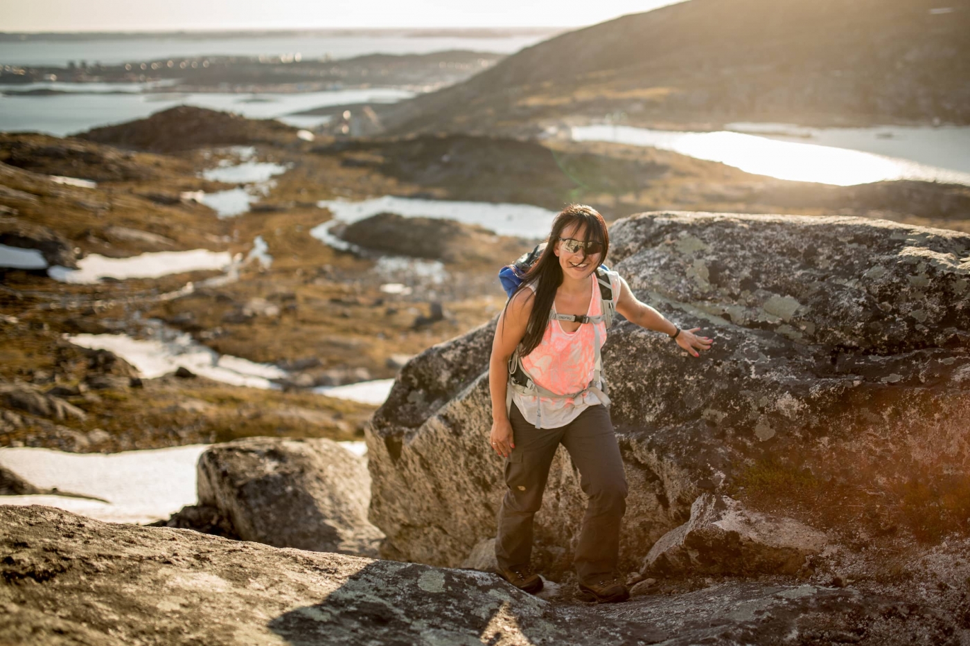 A hiker on the first part of the climb to the Ukkusissaq - Store Malene peak outside Nuuk in Greenland. Photo - Mads Pihl