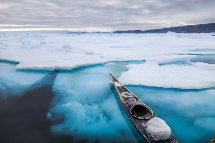 Empty kayak waiting by the pack ice. Photo by Kim Insuk - Visit Greenland