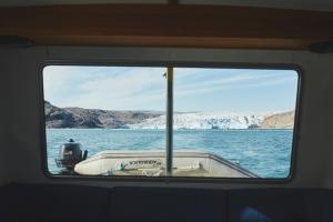 Qalerallit Sermiat glacier seen from inside the boat, Narsaq, South Greenland. Photo by Aningaaq R Carlsen - Visit Greenland.
