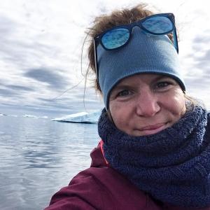 Line - second founder of Sermilik Adventures. Photo - Selfie by Line on a boat trip in the Sermilik fjord