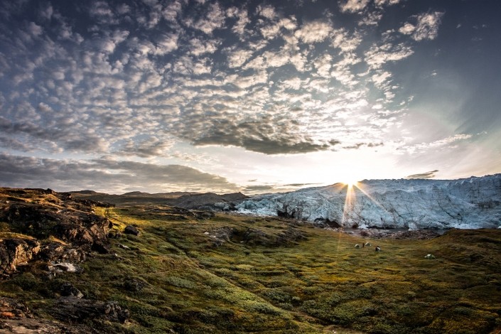 Sunrise over a tent camp by the Russell Glacier near Kangerlussuaq in Greenland. Photo by Mads Pihl - Visit Greenland