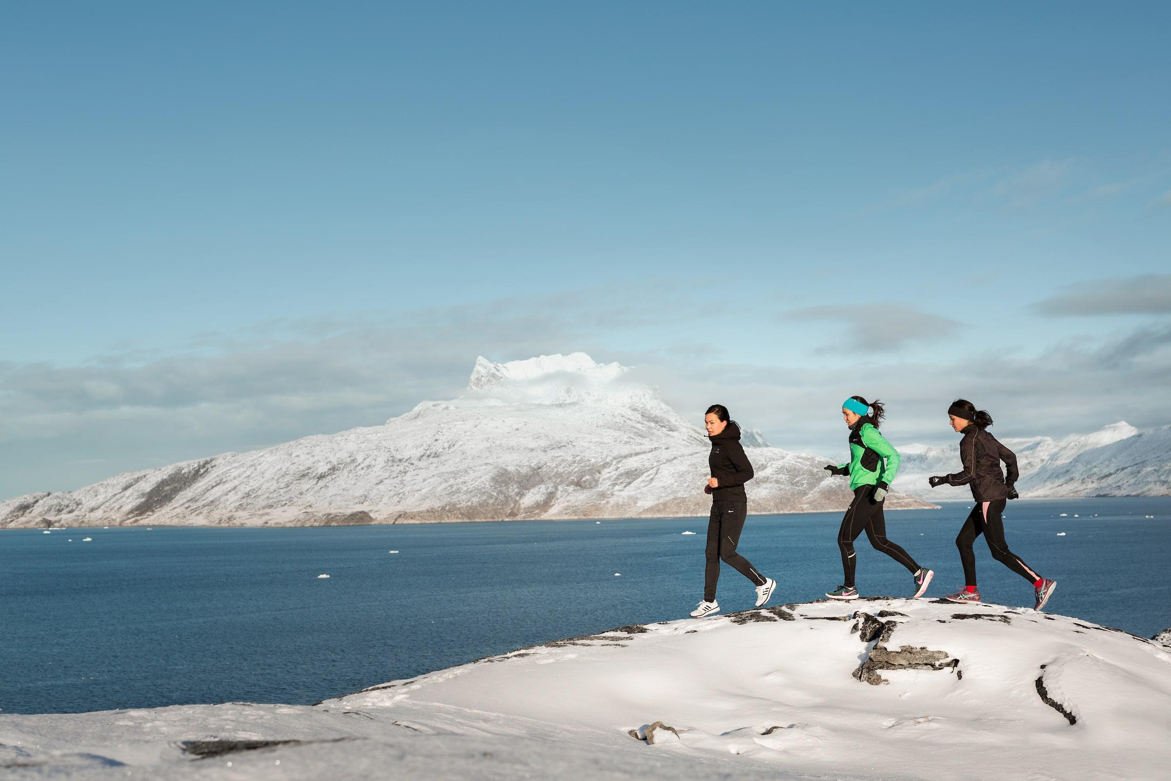 Runners near Mt Sermitisiaq, Nuuk. Photo by Rebecca Gustafsson - Visit Greenland