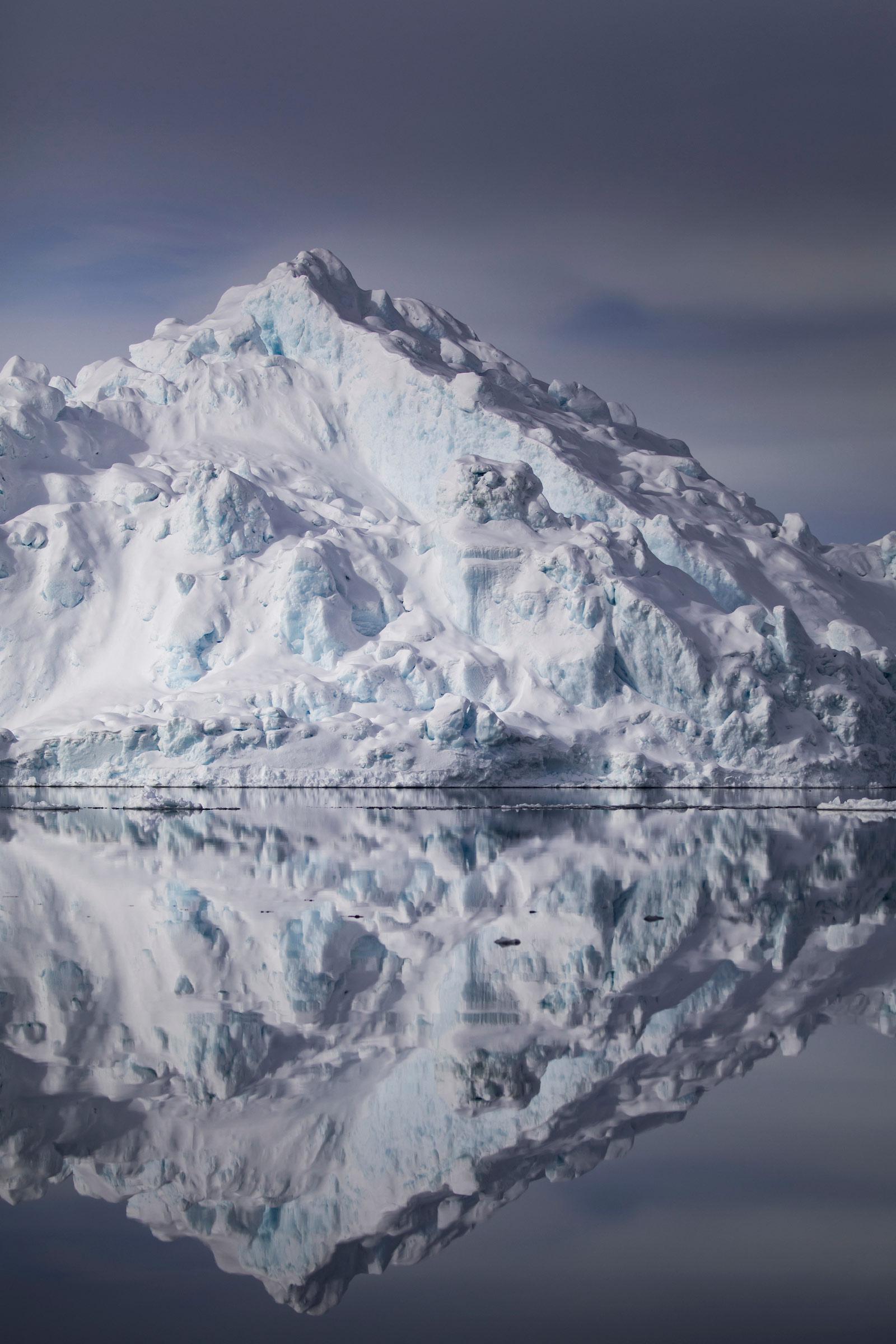 Clear reflection of the ice. Photo by Aningaaq Rosing Carlsen - Visit Greenland