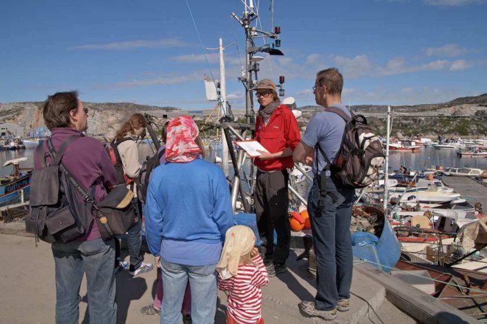 Tourists on a guided sightseeing tour . Photo by Thomas Eltorp