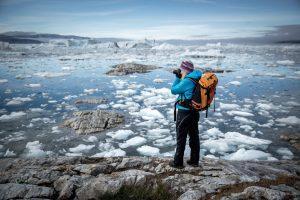 A photographer on an East Greenland photo tour to the Sermilik Icefjord. By Mads Pihl