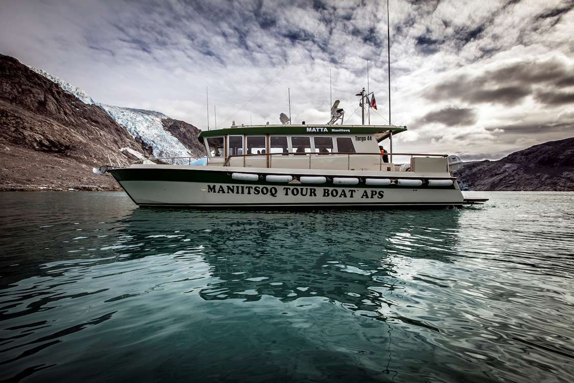 Maniitsoq Tour Boat flagship "Matta" in the Eternity Fjord in Greenland. Photo by Mads Pihl - Visit Greenland