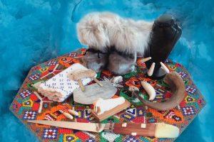 Traditional and cultural goods from Greenland, sealskin boots, ulu, bone carvings, jewelry and more. Photo by Nanu Travel