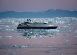 Ponant Cruises L'Austral in early morning light near Ilulissat in Greenland. By Mads Pihl