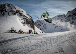 Jumping snowmobiler on snowmobil expedition in Sisimiut. Visit Greenland