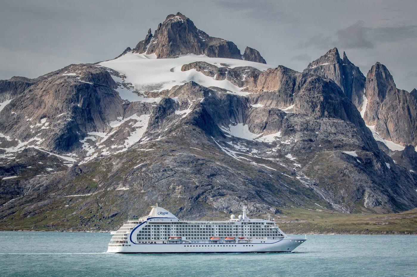 The cruise ship Sevens Seas Voyager passes underneath the mountain Qilertiki in South Greenland near Aappilattoq and Prince Christian Sound. Photo by Sevens Seas Voyager